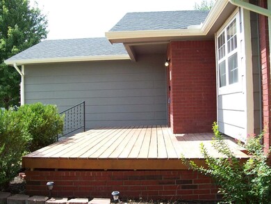 12x20 front porch, large wood, hand rail