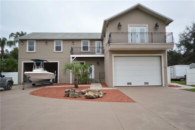 FRONT OF HOME2 CAR GARAGE ON THE RIGHT 1-2 CAR CARPORT ON THE LEFTGARAGE DOOR CAN EASILY BE INSTALLED