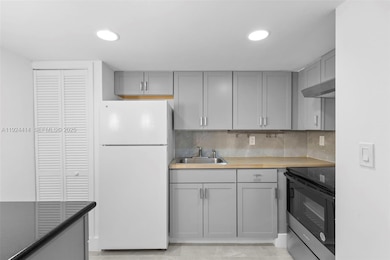 4335 NW South Tamiami Canal Dr unit 405, Miami, FL 33126 - photo 3