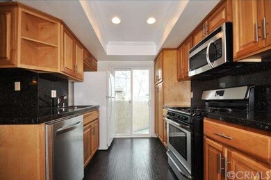 Newer range, recessed lighting and beautiful slide