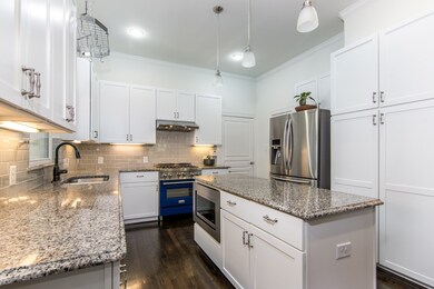Note the microwave in the island, updated vent hoo