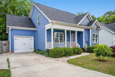 Single garage with extra parking pad