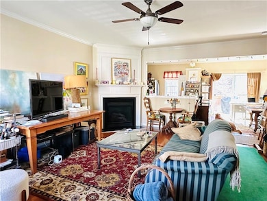 Family room with view into kitchen/dining