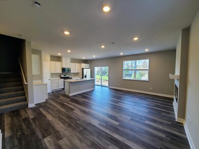 Ellsworth View towards Kitchen and Dining Room from Family Room