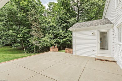 Home includes newer concrete rear patio.