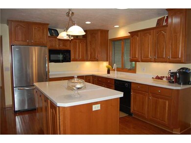 Kitchen. Hickory, Corian & Stainless, Lots of Stor