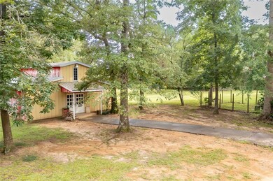 35 x 35' barn, cement floors. Room enough for 5-6