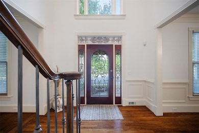 Entryway featuring plenty of natural light, wood f
