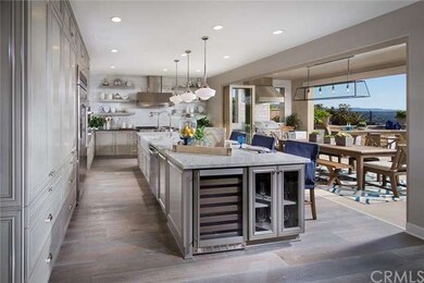 Gorgeous kitchen with large center island opens to