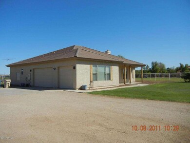 Property Side View with Garage
