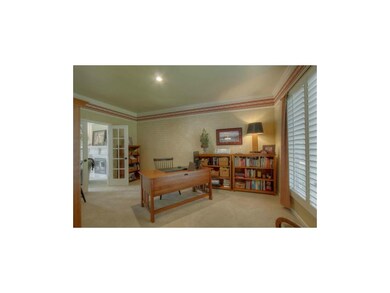 Main floor Office w/ french doors & plantation shu