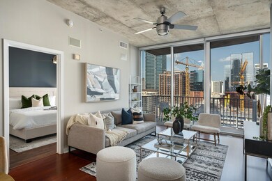 Living area featuring wood finished floors, a vie