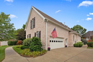 Side entry garage with huge parking pad. Notice the side entry door, which gives you an indication of how big the inside of garage is.