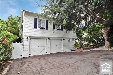 Carriage house over garages