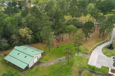 Barn has two overhang areas for storage and equipment if needed. Water Well is behind the barn!