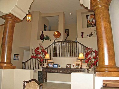 Other. Vaulted celling and dual staircase add to t