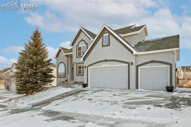 Front facade featuring a 3 car garage
