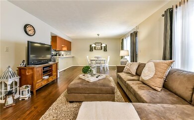Open floor plan with neutral color scheme.