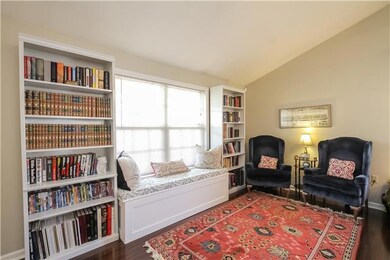 View from foyer entry of sitting area in great room. 