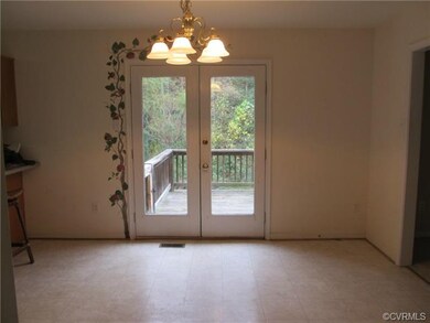 Breakfast area with French doors to deck