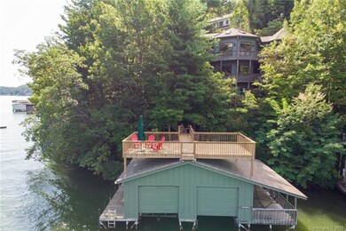 Double Bay Boathouse with Lifts. Sundeck built 201