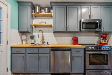 Kitchen with butcher block countertops, decorative