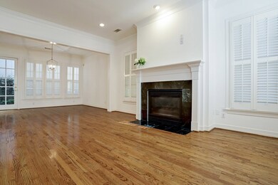 Gleaming oak floors provide warmth and the neutral