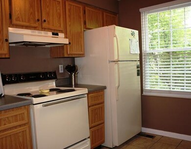 Kitchen. The 12  x 9  open kitchen area has new ce