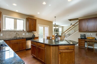 Large kitchen. Lovely island. And LOTS of cabinets!