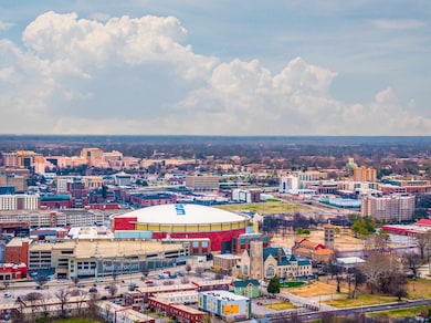 Birds eye view of property with a city view