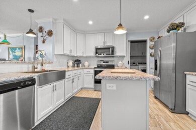 Kitchen featuring tasteful backsplash, separate wa