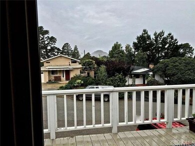 Slider Door to Front Deck and view of Rock