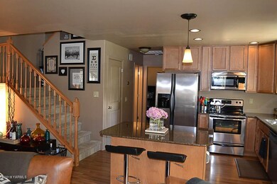 Kitchen Area & Stairwell to 2nd Level