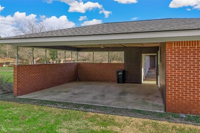 Carport with bonus room/shop