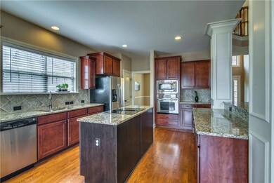 Cherry cabinetry and a pantry complete the package.  