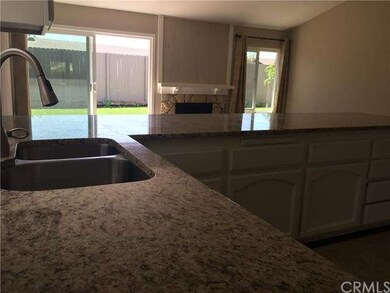 Open floor plan kitchen and family room with vault