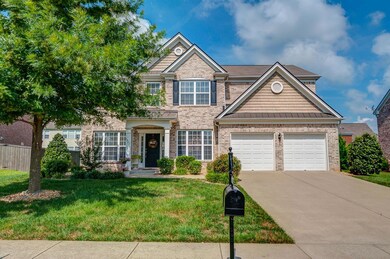 Beautiful, mature landscaping on this level lot