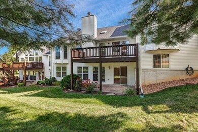 Rear view showing large deck and patio for family 