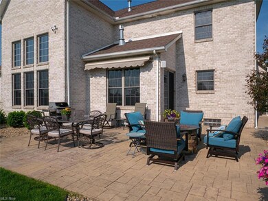 Stamped concrete patio, stereo speaker, retractabl