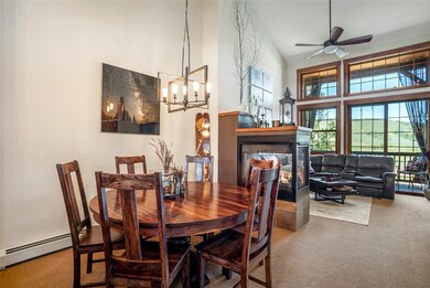 Dining room featuring carpet, ceiling fan with not