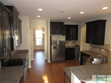 Kitchen with Granite Tops and Stainless Appliances
