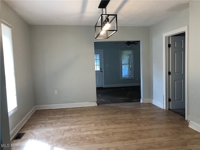Dining area featuring light wood finished floors