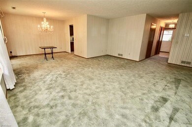 Spare room with light carpet