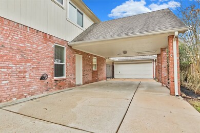 Double wide driveway provides uncovered space for more vehicles.