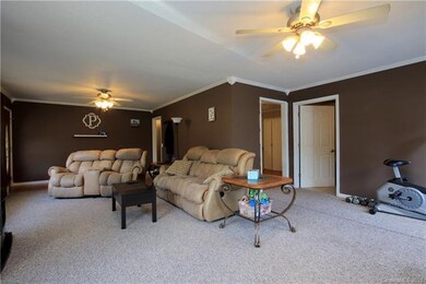 Very large, freshly painted, great room with crown