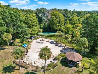 less than 5 minute walk to a white sand, private beach on the Weeki Wachee River