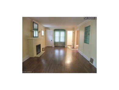 The living room welcomes you in to the home and st
