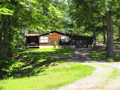Side of Home & partial driveway