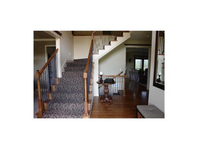 Entry way with new carpet on all stairs