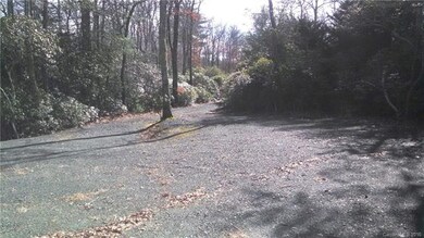 Level, with gravel drive